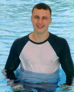 Swimming in t-shirt in pool with goggles