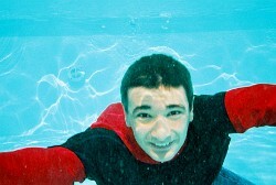 with an anorak in pool swim underwater