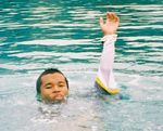 RESCUE, SIGNALS, A WEAK SWIMMER
A weak swimmer signalling for help 1