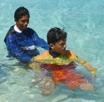 RESCUE, TOWING, DOUBLE SHOULDER TOW
Hold the casualty below the shoulders and swim with backstroke 15